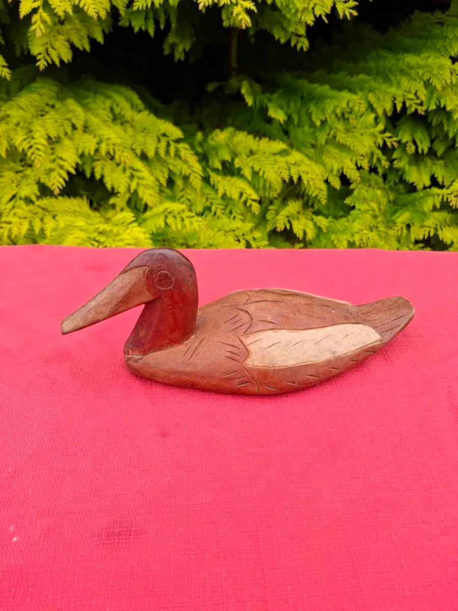 Wood sculpted duck possible to post