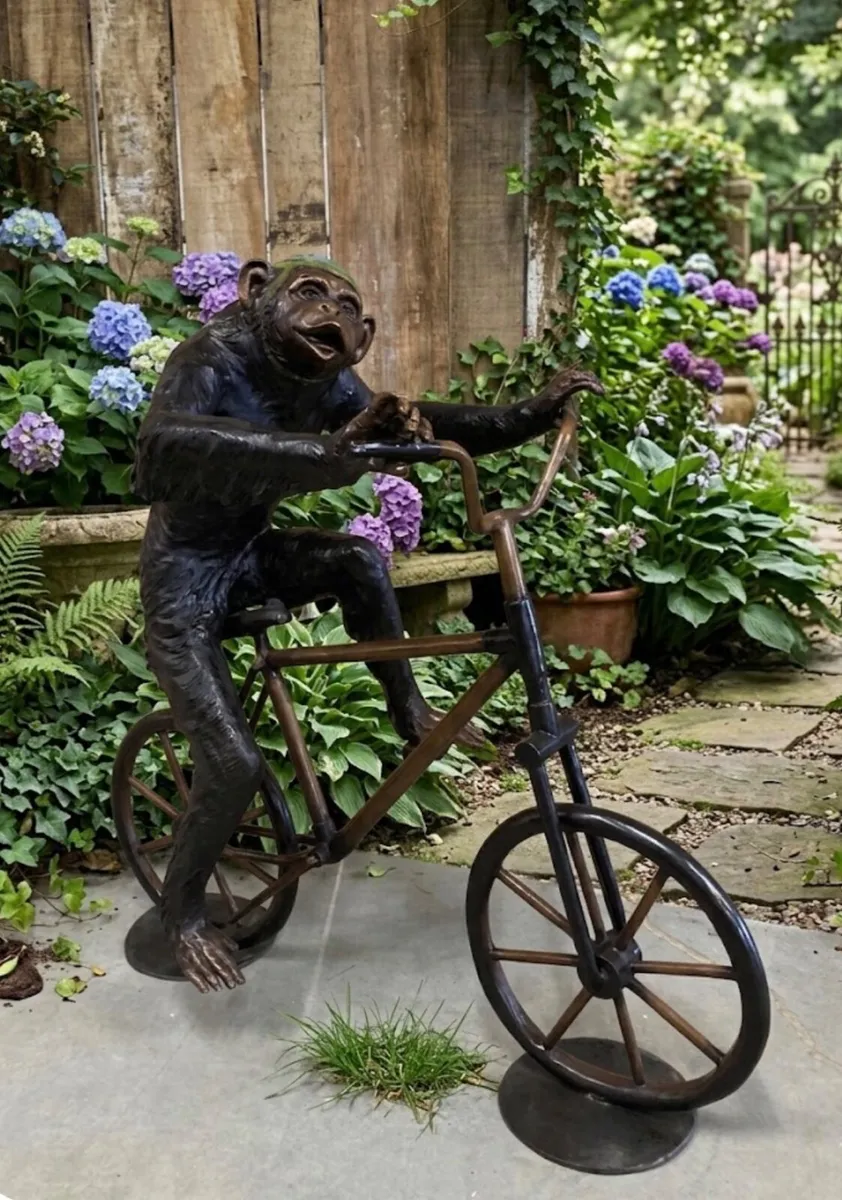 Bronze monkey on bike sculpture life size - Image 1