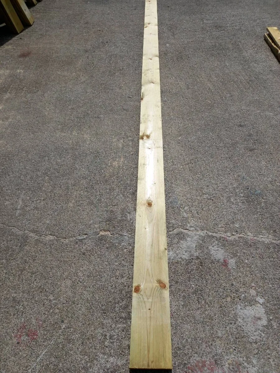 Bundle of treated timber - Image 1
