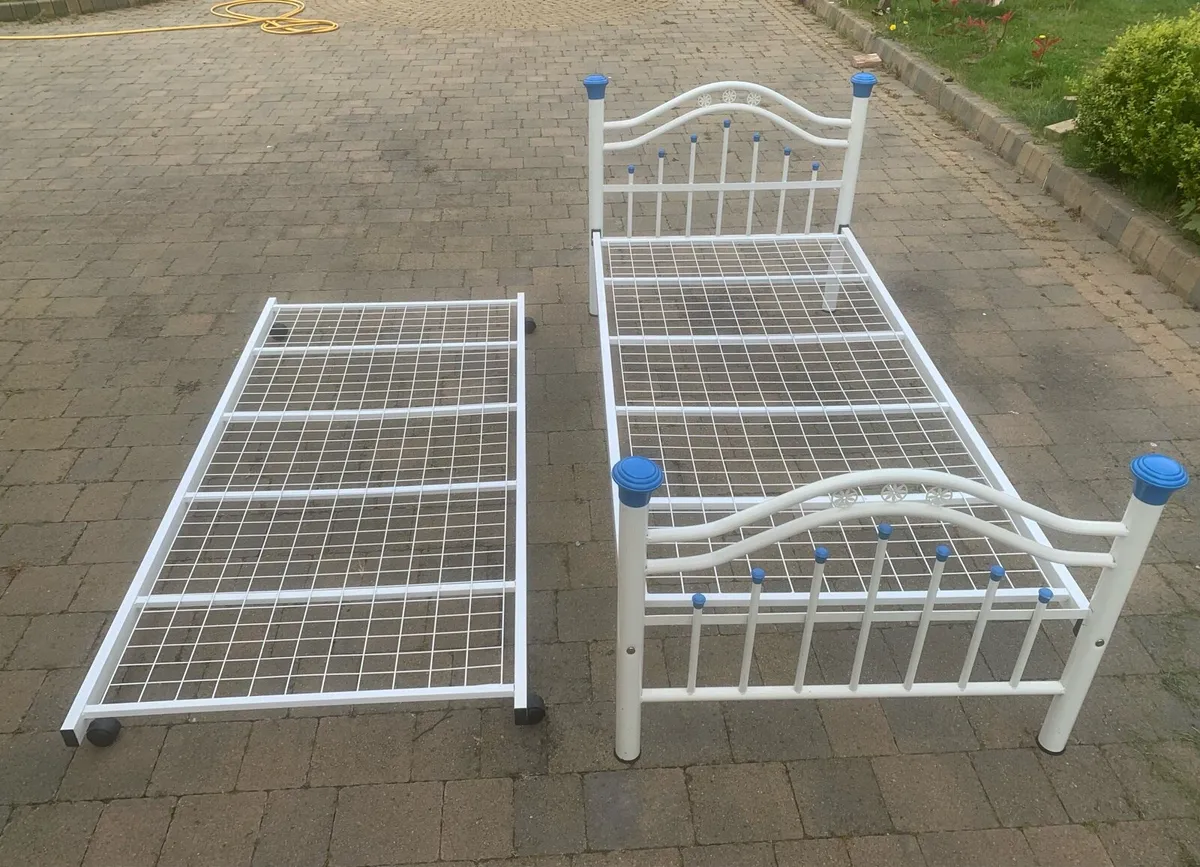Single bed with spare mattress