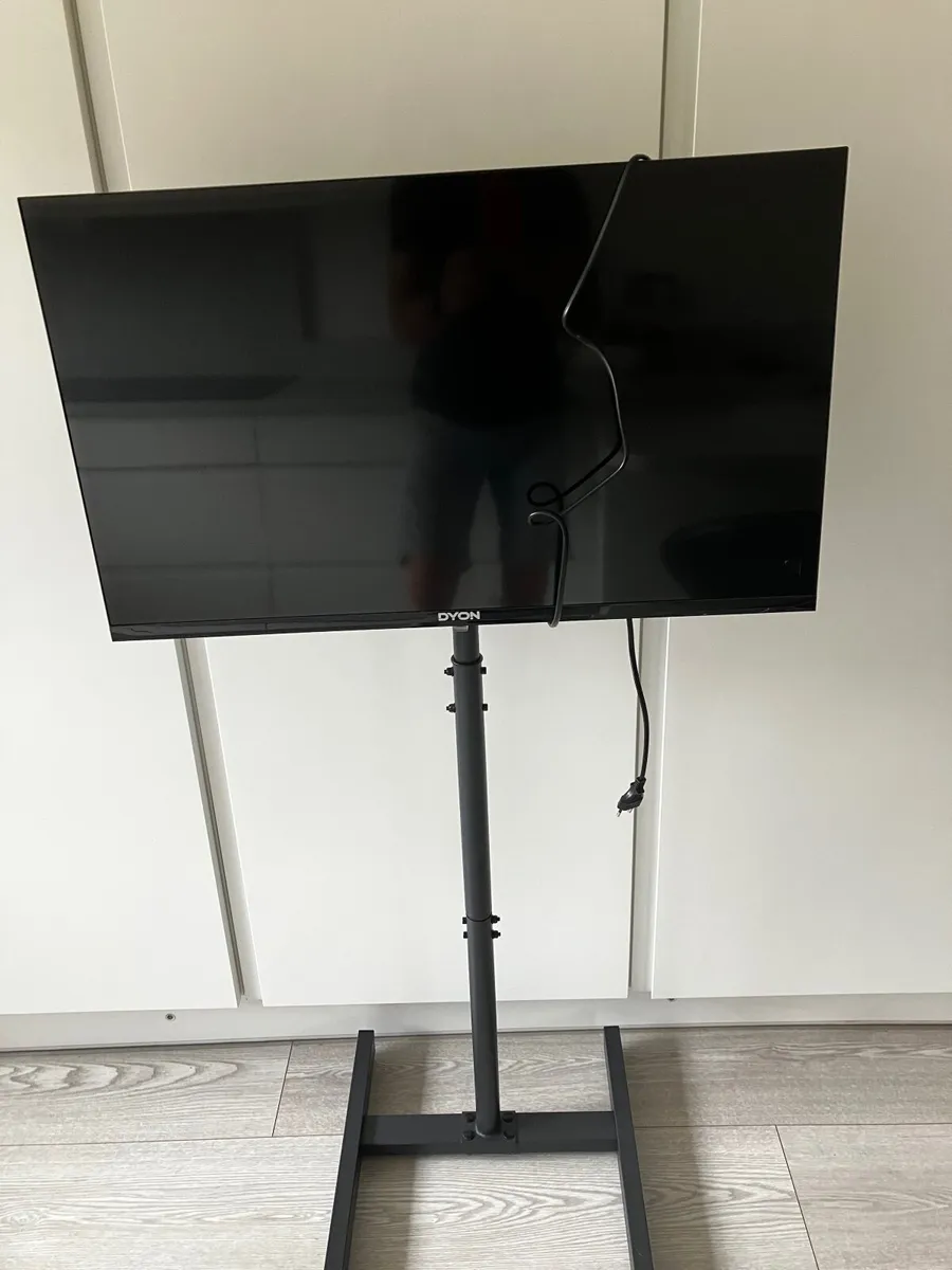 Television + tall stand - Image 1