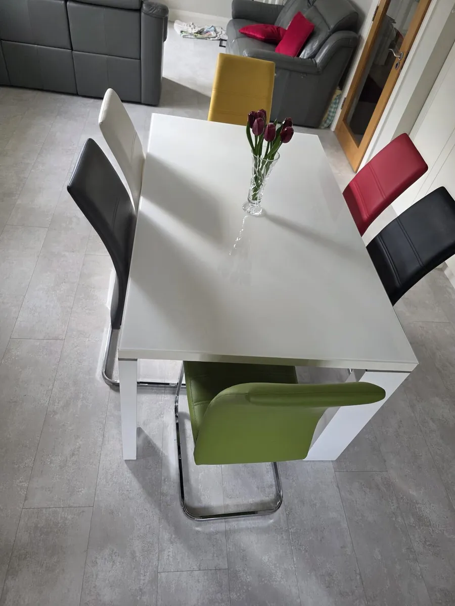 Glass top table and 6 chairs - Image 1