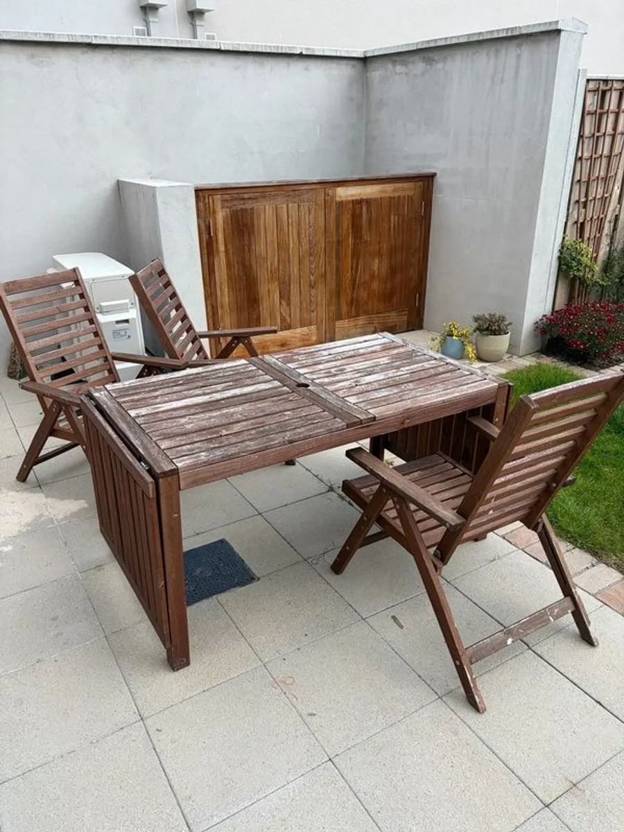 Patio table and three chairs - Image 1