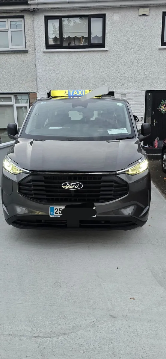 Ford Custom  9 Seater Plug in Hybrid Taxi - Image 1