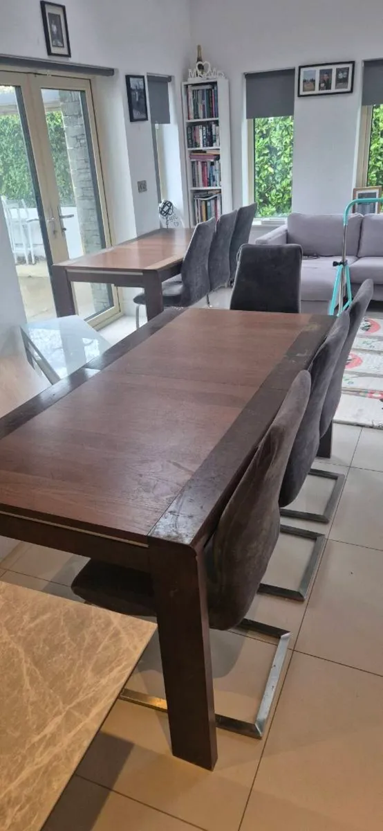 2 x walnut extendable tables and 8 grey chairs - Image 1
