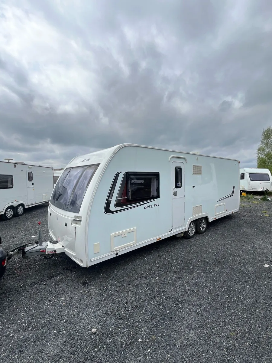 2014 Lunar 4 Berth Fixed Island Bed Caravan - Image 1