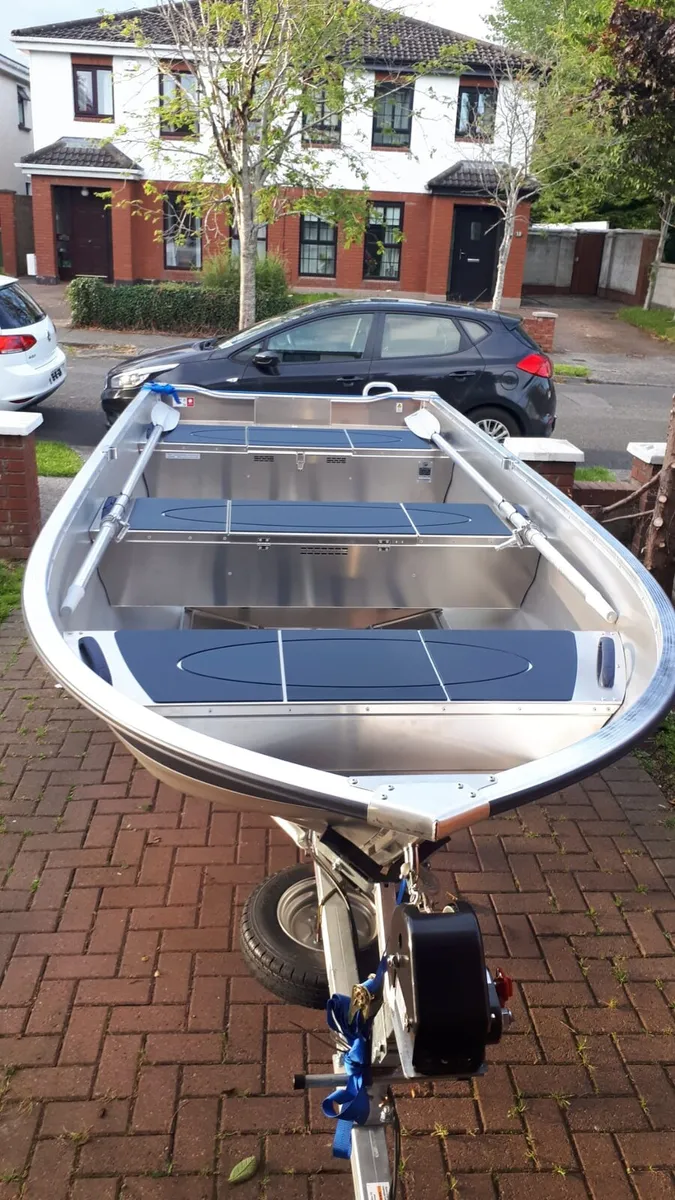 Linder 400 Boat & Suzuki 9.9HP Long Shaft &Trailer - Image 1
