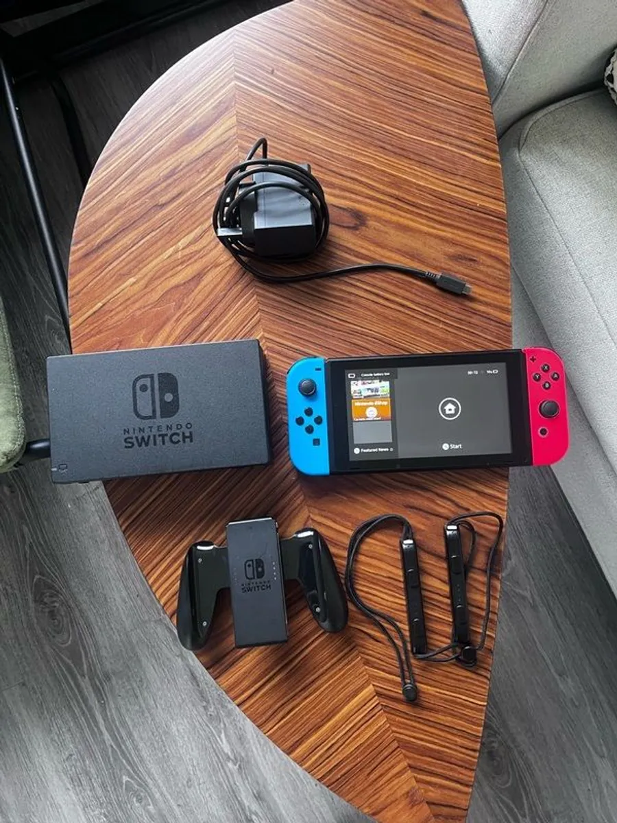 Nintendo Switch + Game - Image 1