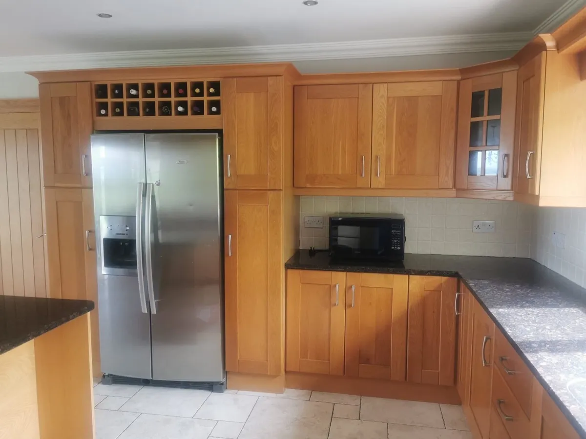 Solid oak shaker style kitchen and island - Image 1