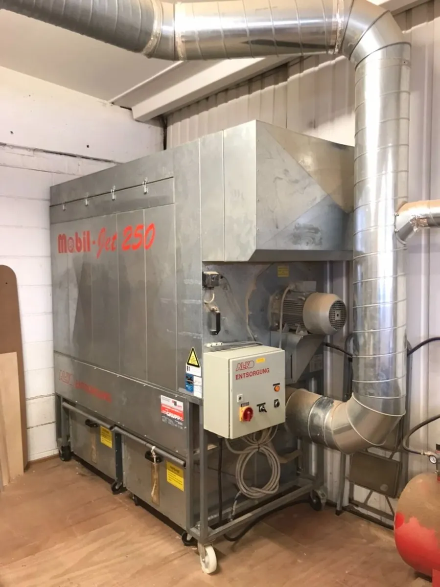 Dust extraction system for woodworking machinery - Image 1