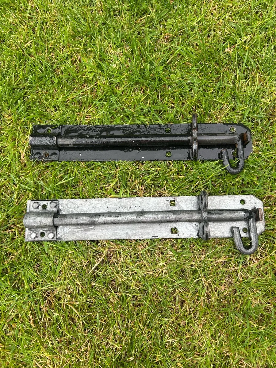 Two sliding bolt latches