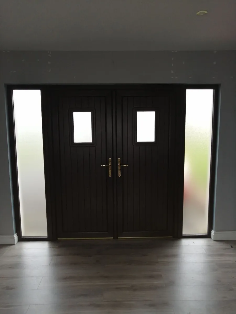 Double front doors with frosted side. - Image 1