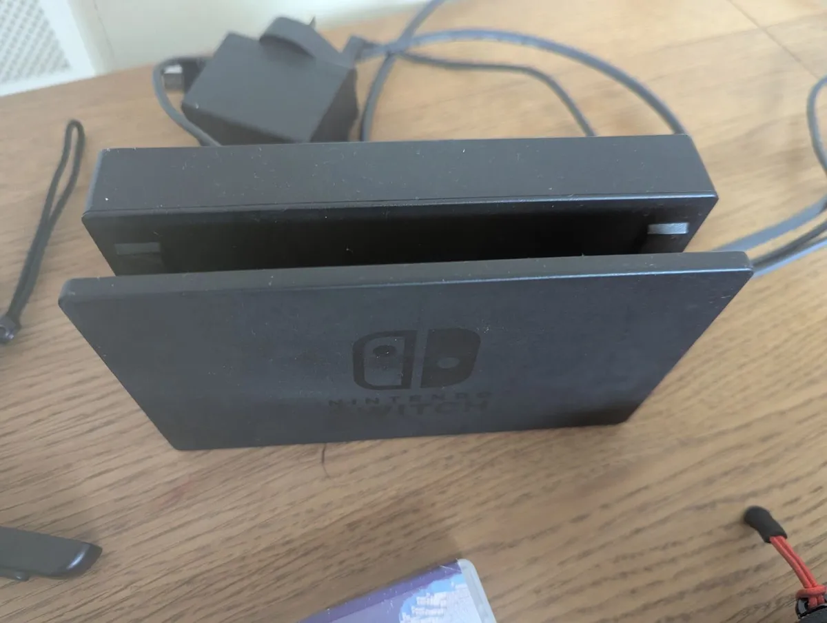 Nintendo switch with 16 games and accessories - Image 2