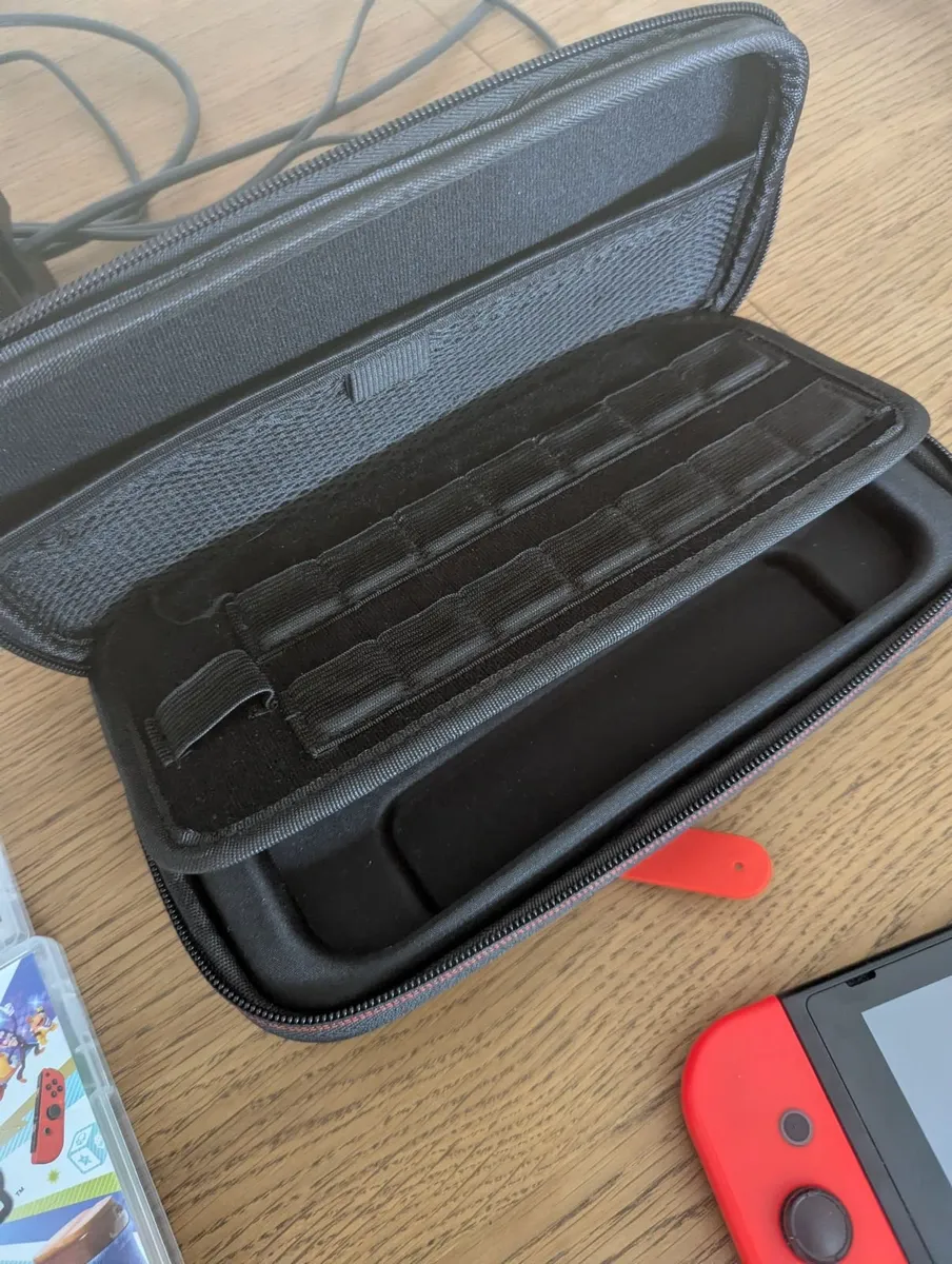 Nintendo switch with 16 games and accessories - Image 3