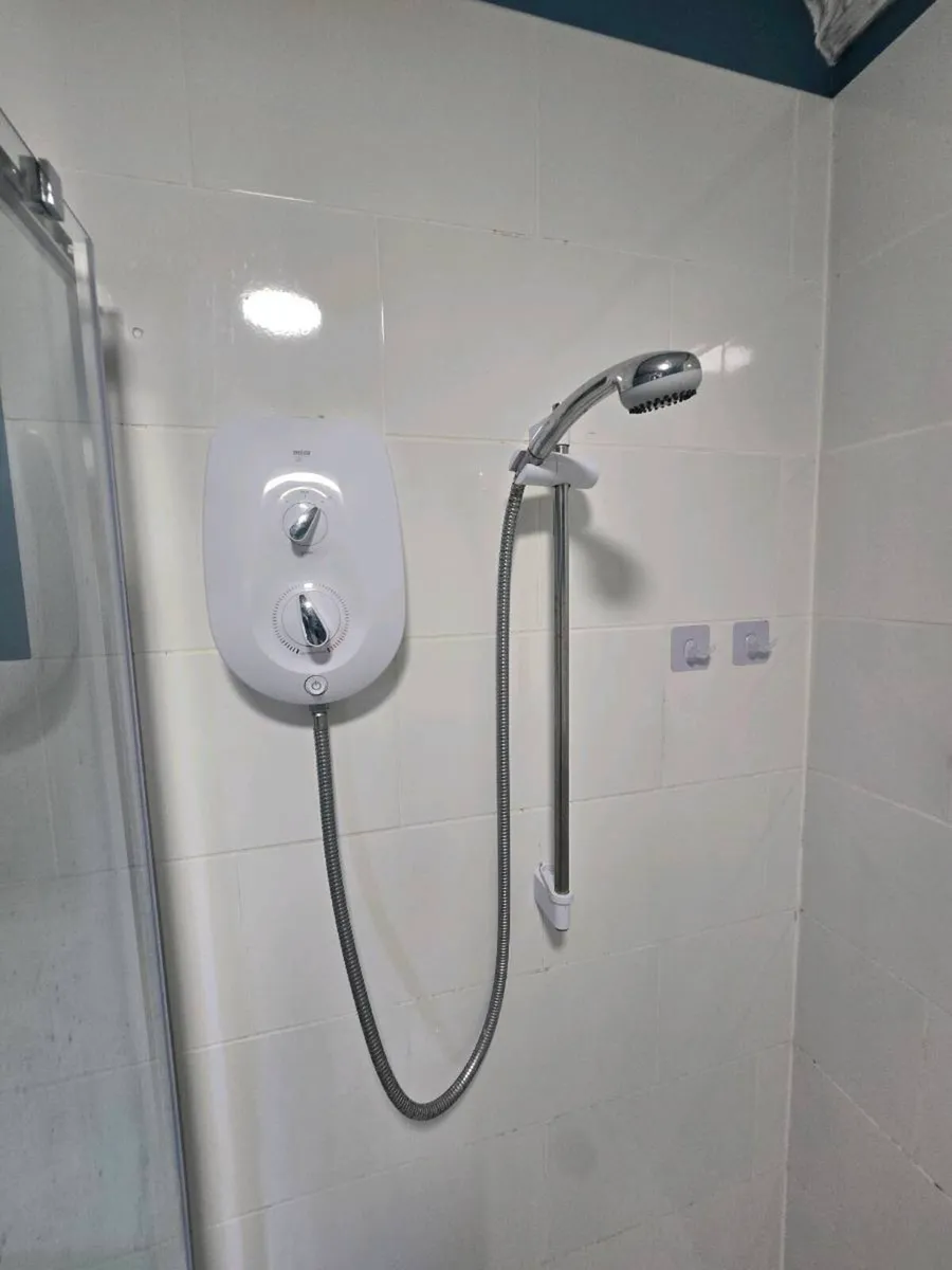 Bathroom shower,sink and toilet - Image 2