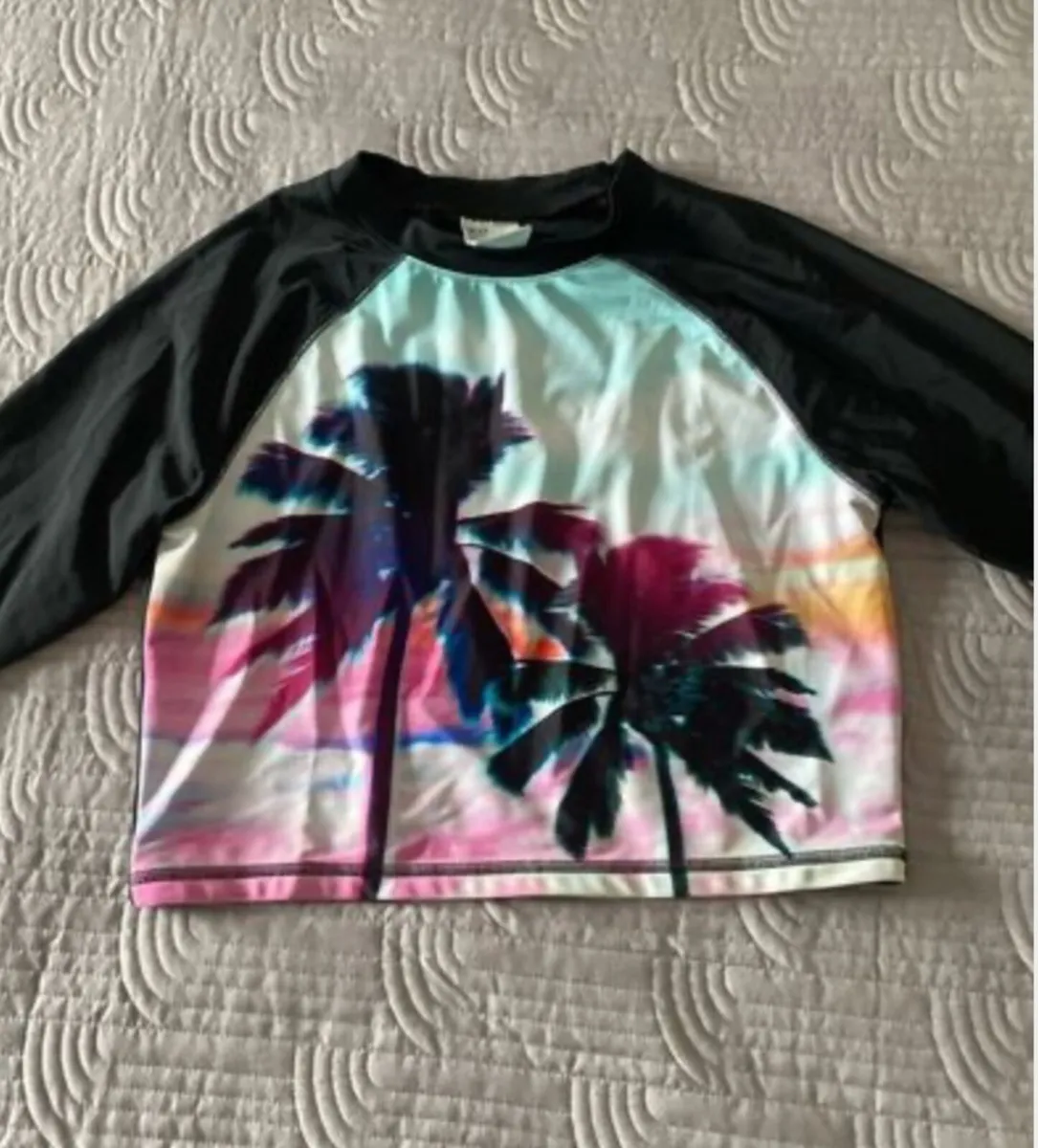 H&M Sun Protector Wet Top - Image 1