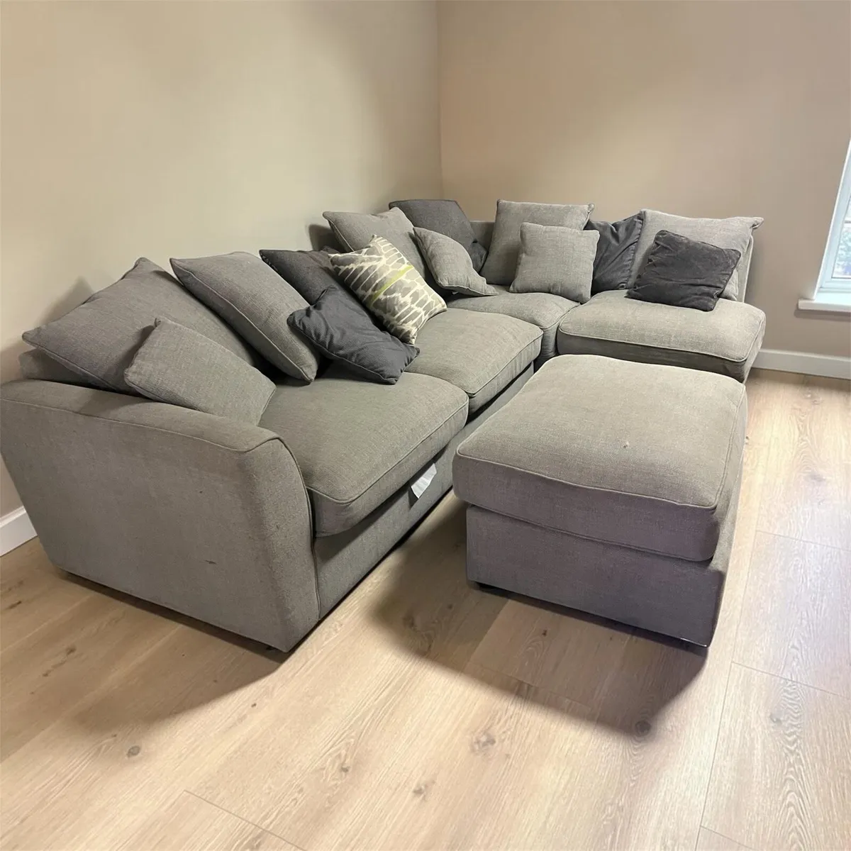 Grey corner sofa with matching footstool - Image 1