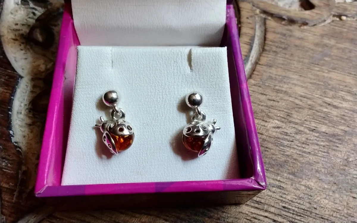 Sterling silver baltic amber ladybird stud earring - Image 1