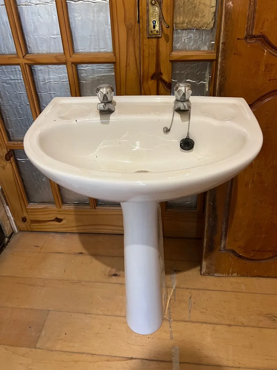 Sink with pedestal