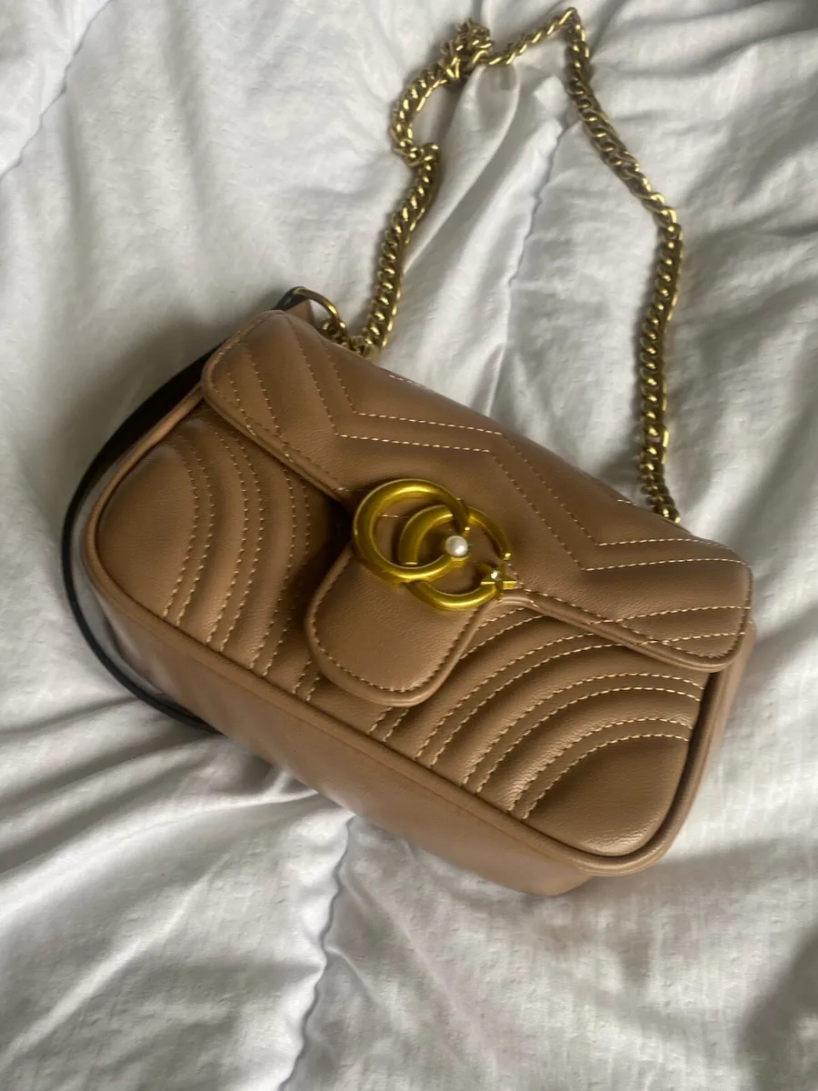 Tan and gold bag - Image 1