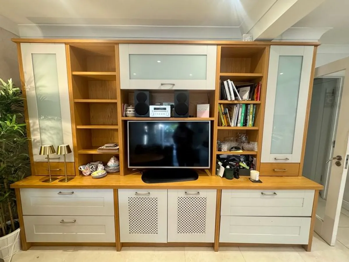 large wooden entertainment center or wall unit featuring a mix of open shelving, glass fronted cabinets, and lower drawers - Image 2