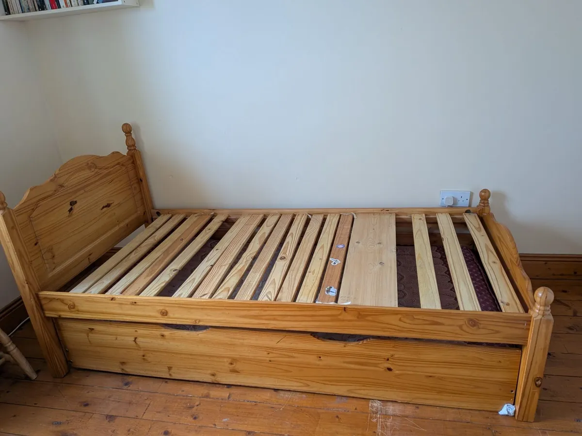 Single bed frame with roll out bed underneath - Image 1