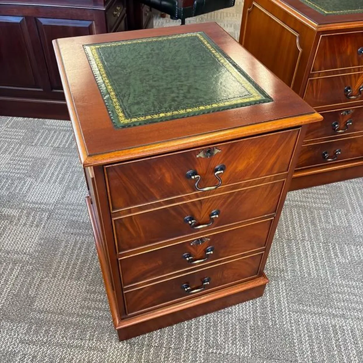Stunning green leather top filing cabinet. Key inc