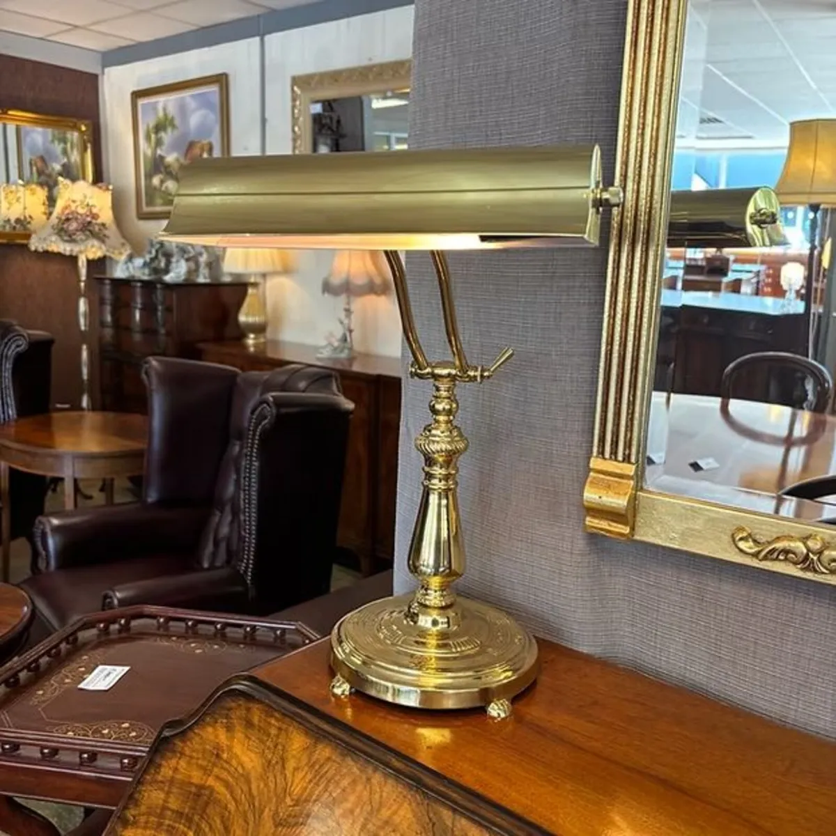 Vintage banker's desk lamp is a polished brass