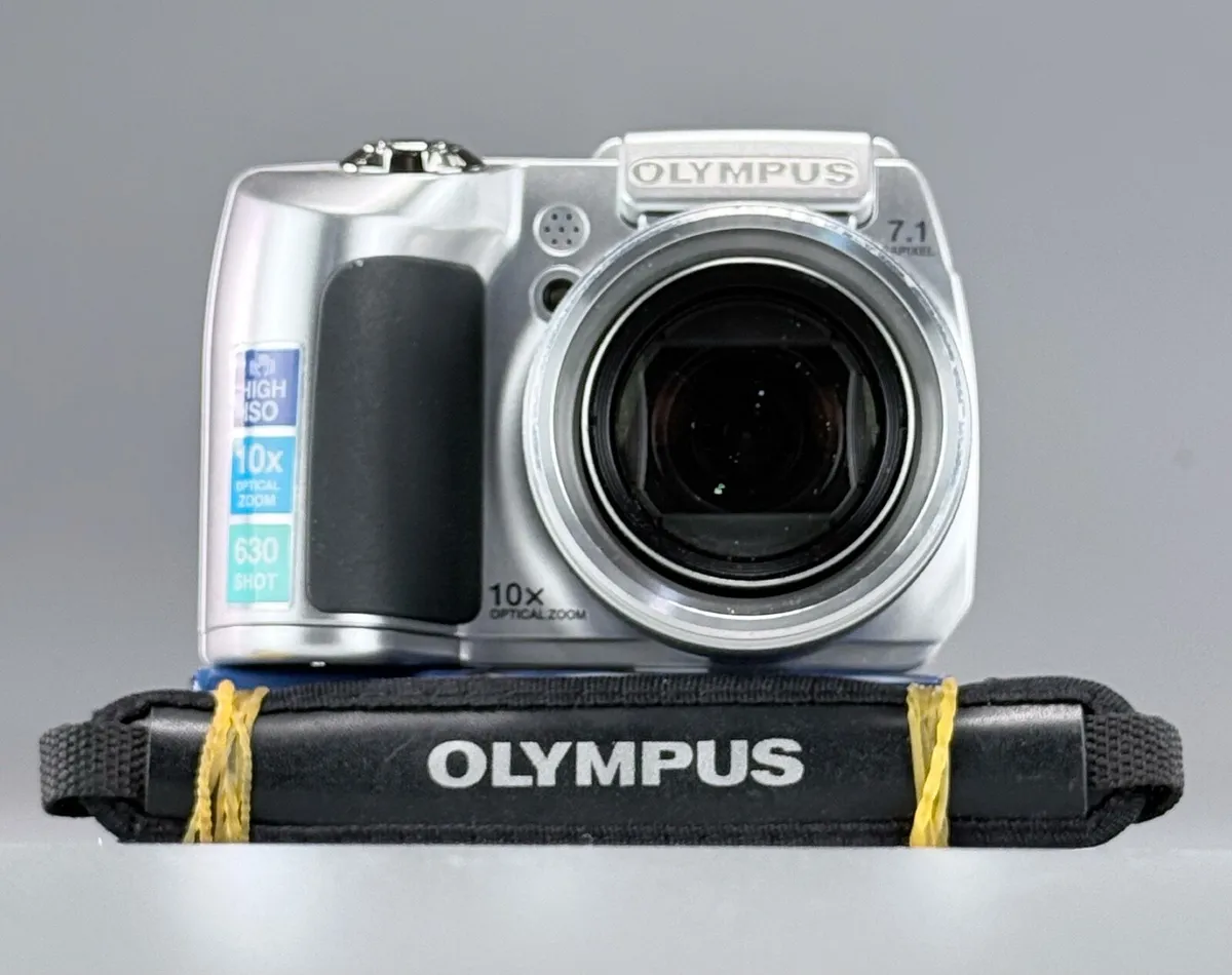 Olympus SP-510UZ, a 7.1 MP digital bridge  camera - Image 1
