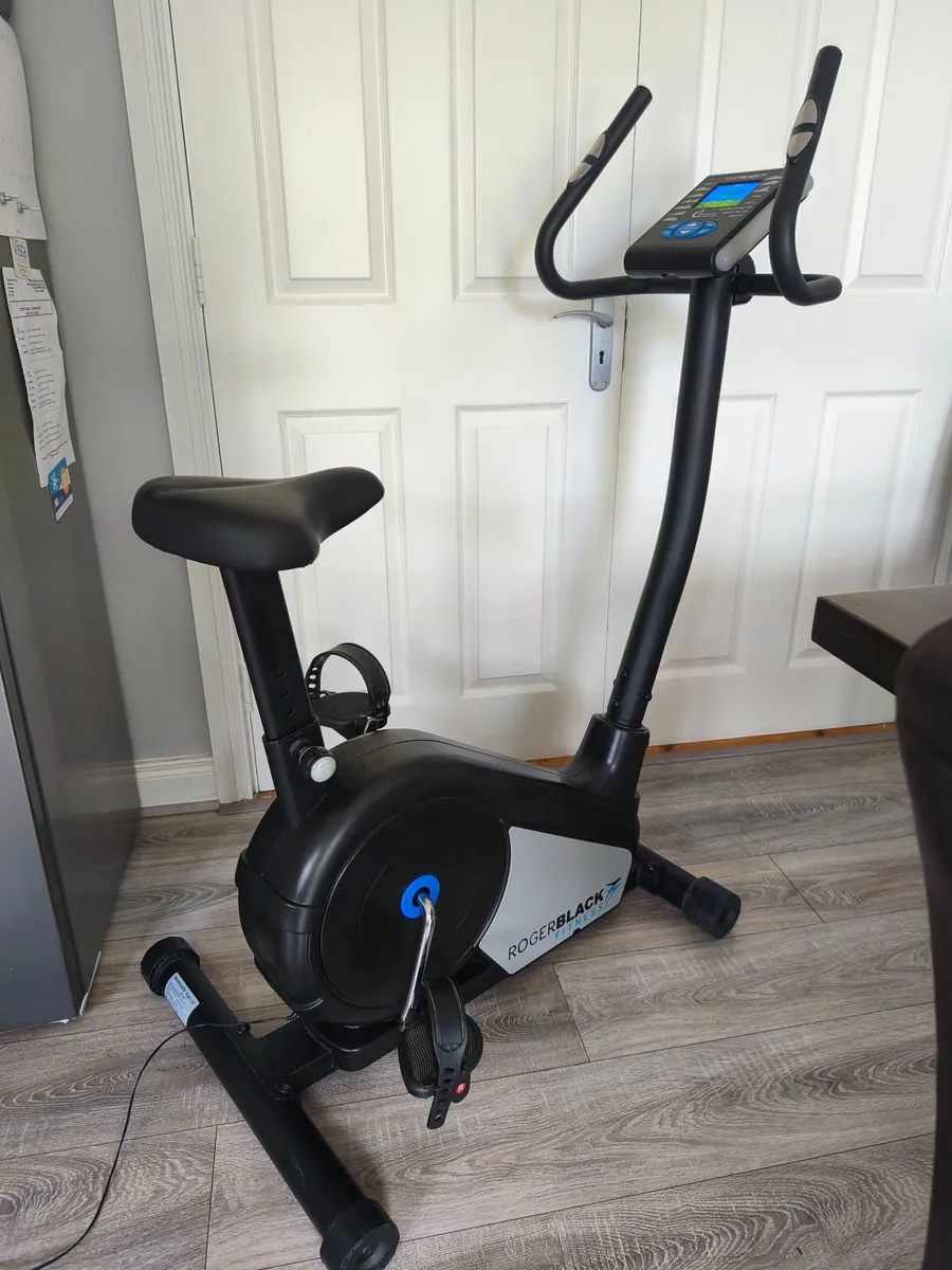 Roger black electric exercise bike with plug - Image 1