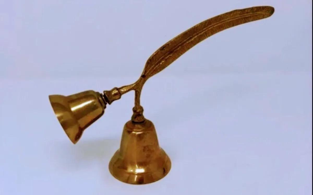 Vintage brass double bell with feather handle