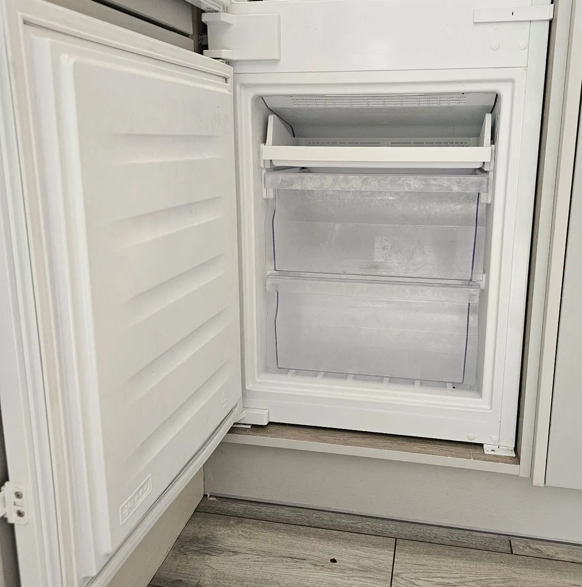 Whirlpool integrated fridge freezer - Image 1