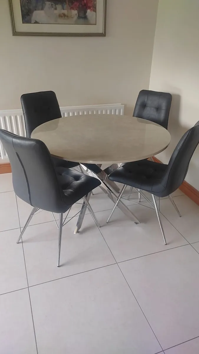 Round Dining Table and 4 faux leather chairs - Image 1