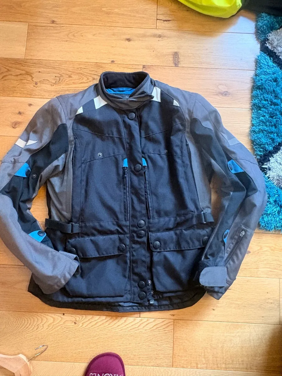 Motorcycle jacket & trousers, helmet and boots - Image 1