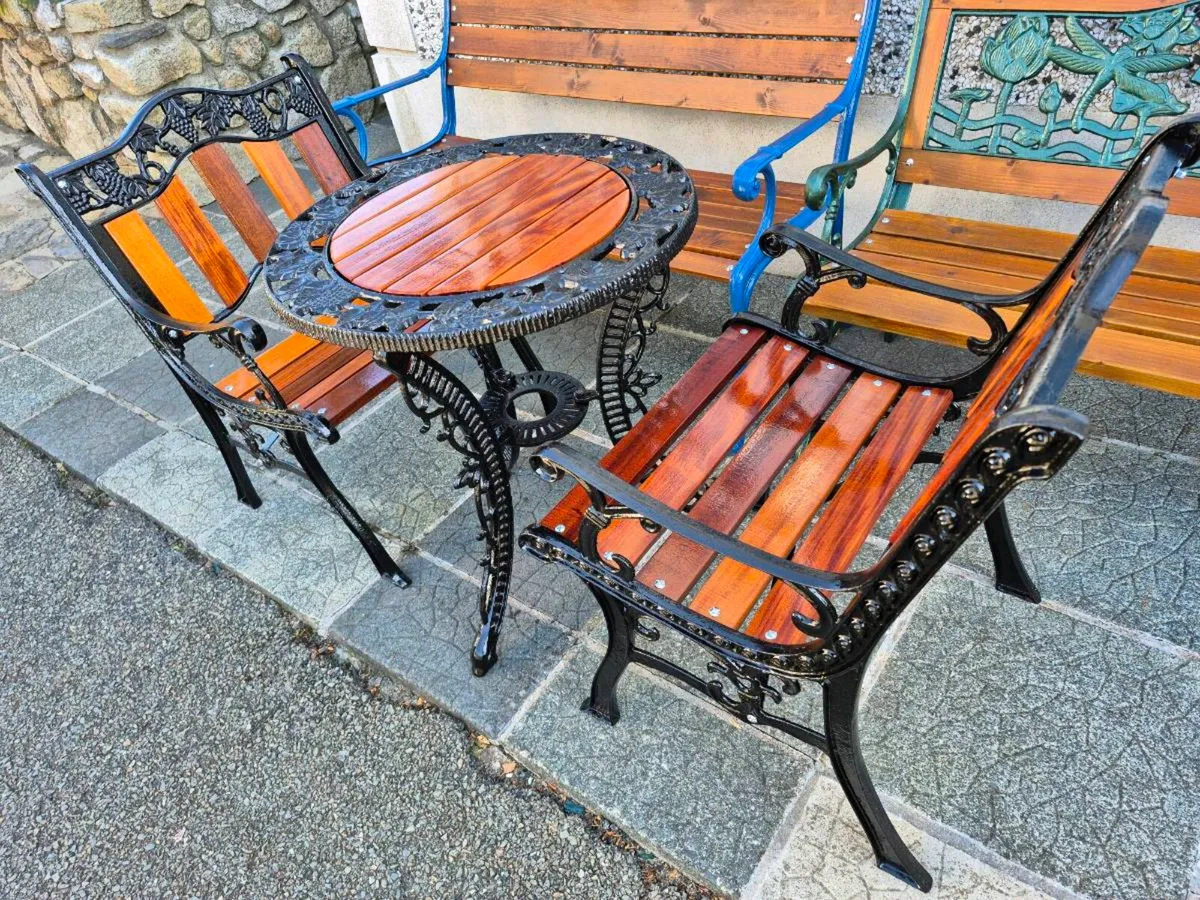 Cast iron table and chairs - Image 2