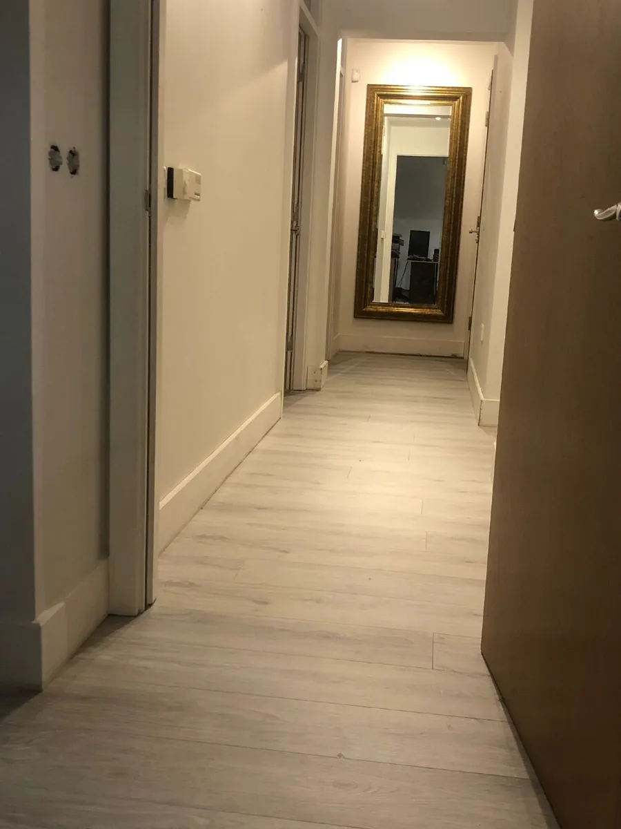 Laminate fitter - Image 1