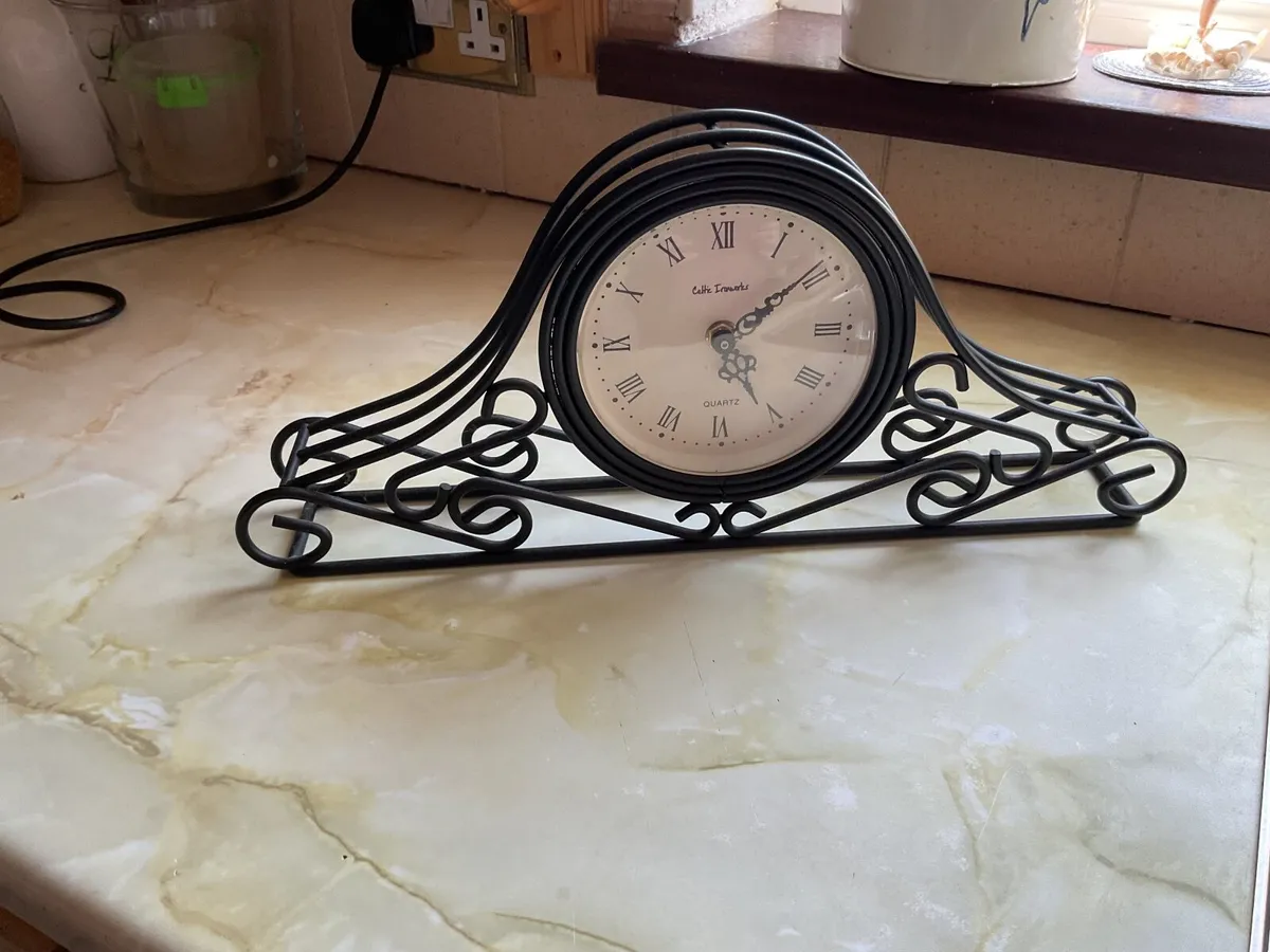 Black metal clock