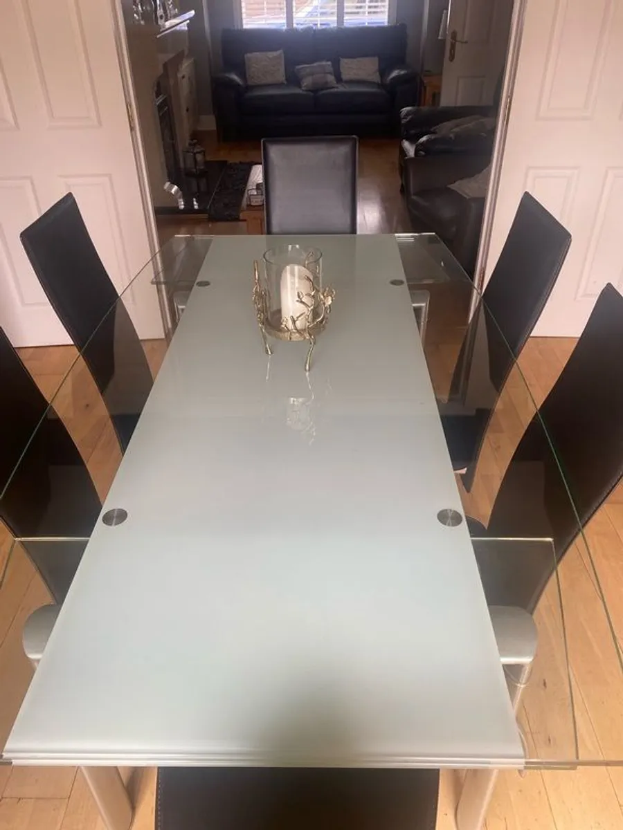 Glass & Chrome Dining Room Table with 6 Black leather and Chrome Chairs - Image 1