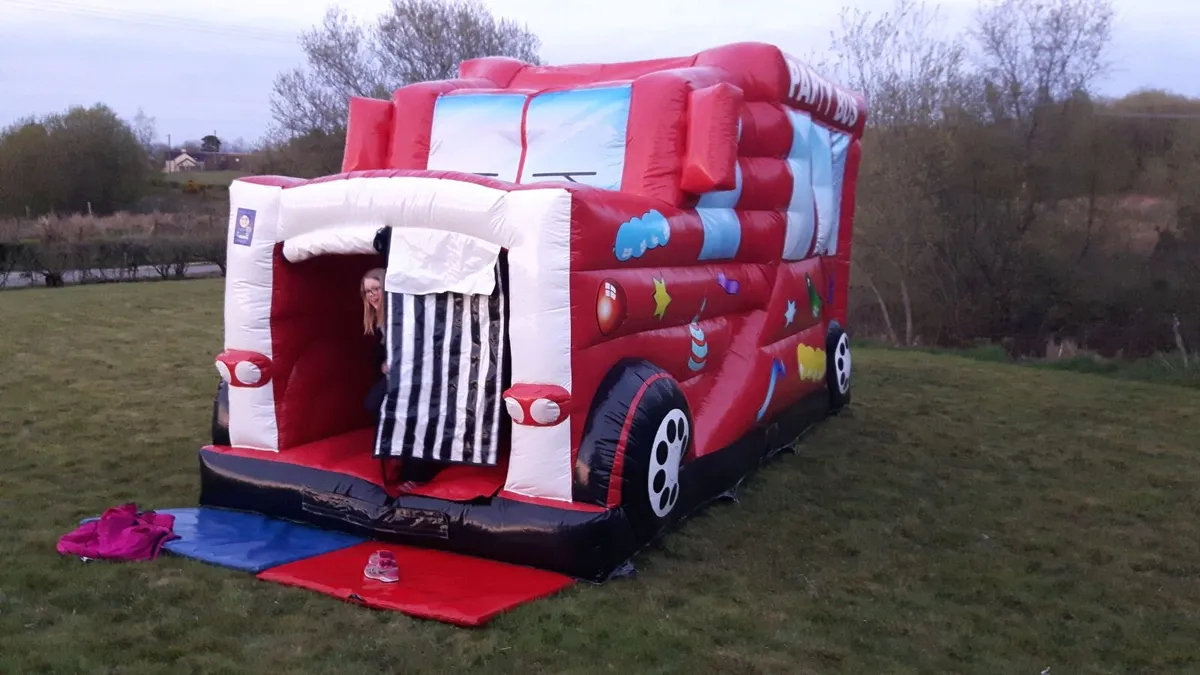 AIRQUEE BOUNCY CASTLE PARTY BUS WITH SLIDE - Image 4