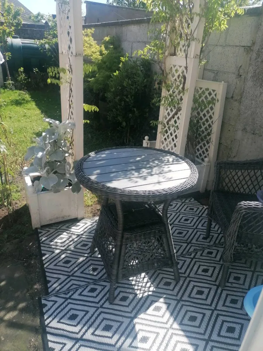 Grey outdoor wicker table