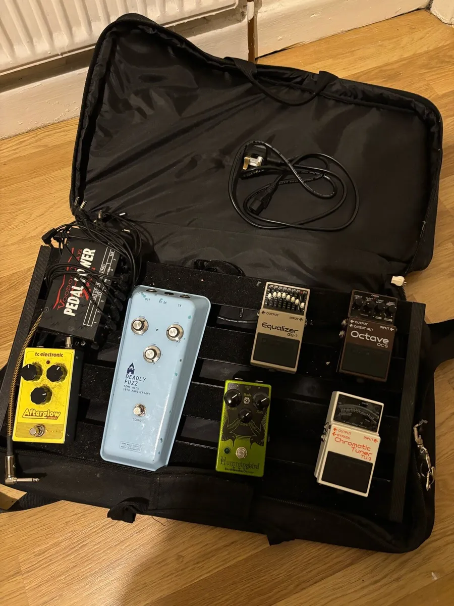 Guitar pedal collection with power supply and case - Image 1