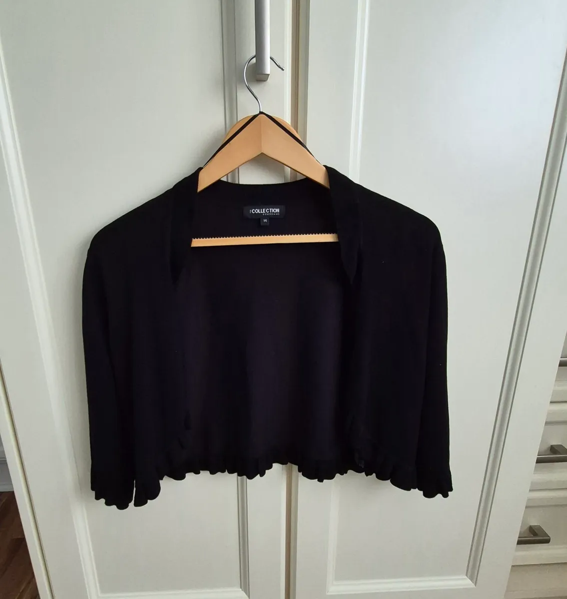 Black shrug