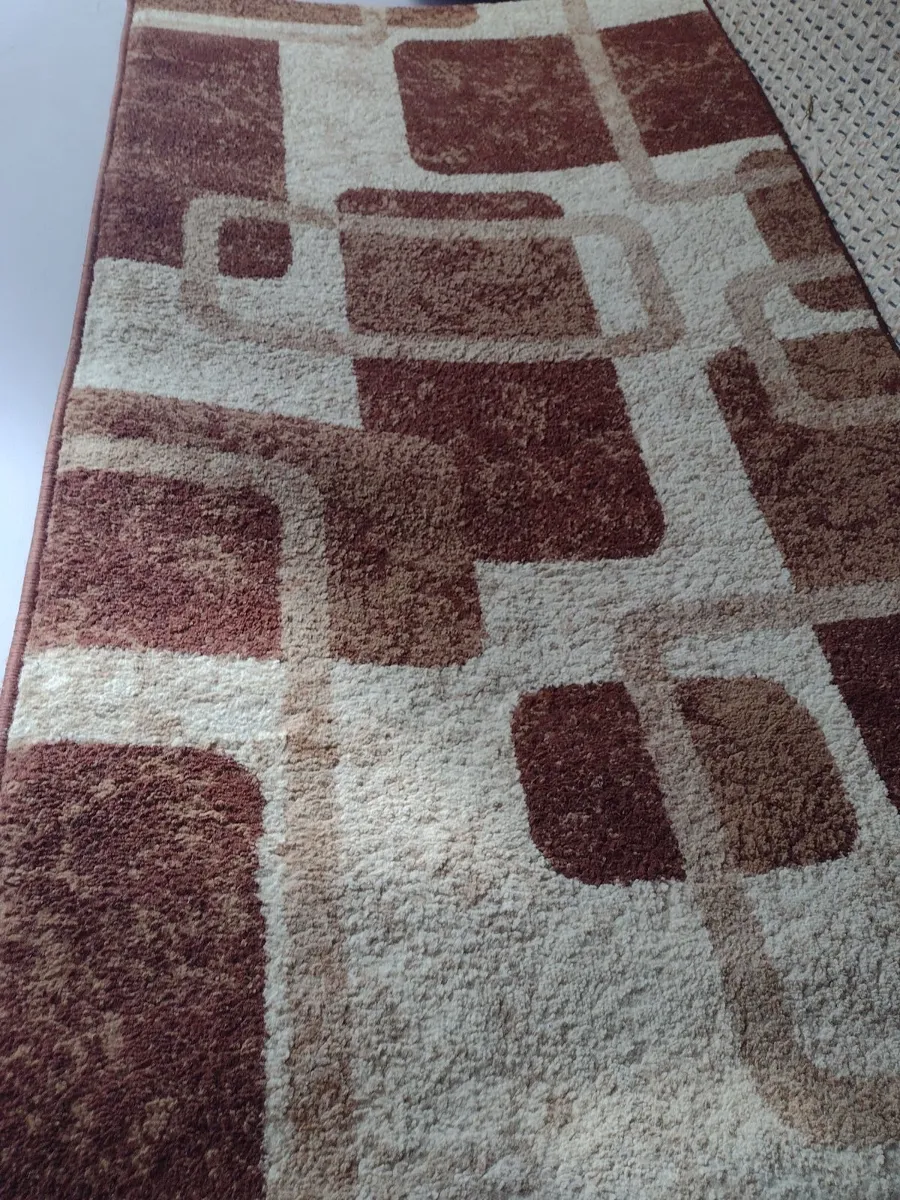 Clean beige/brown rug - Image 1