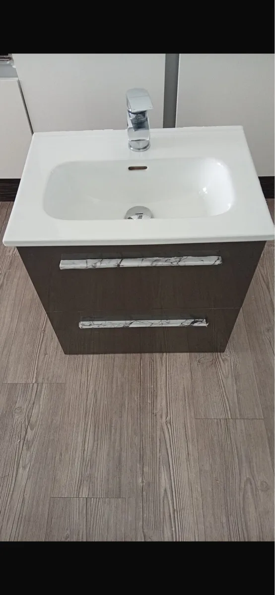 Bathroom sink tap and cabnet
