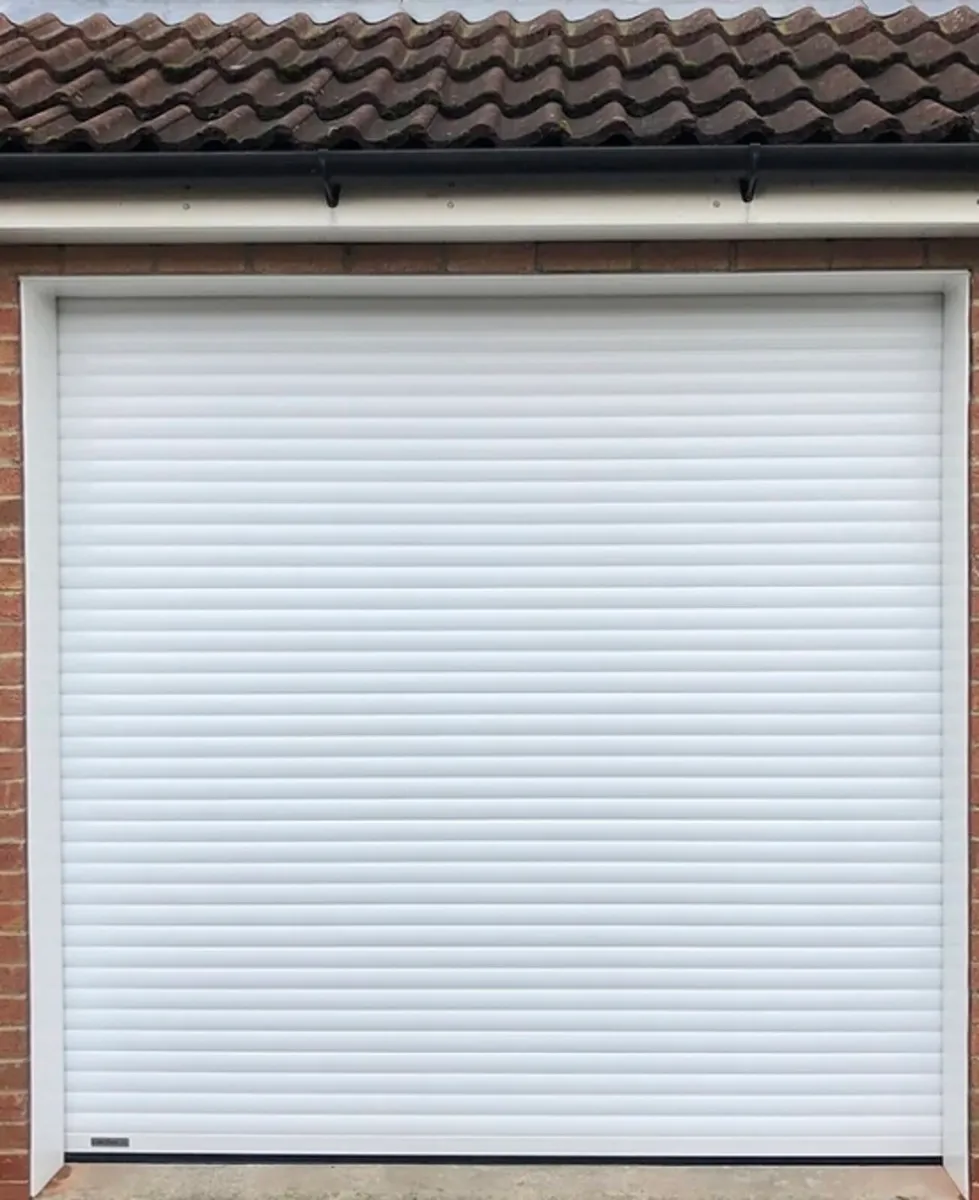 Rolls up garage door new just could not fit it