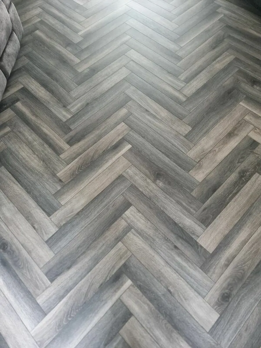 Brand new Herringbone Laminate Wood flooring - Image 1