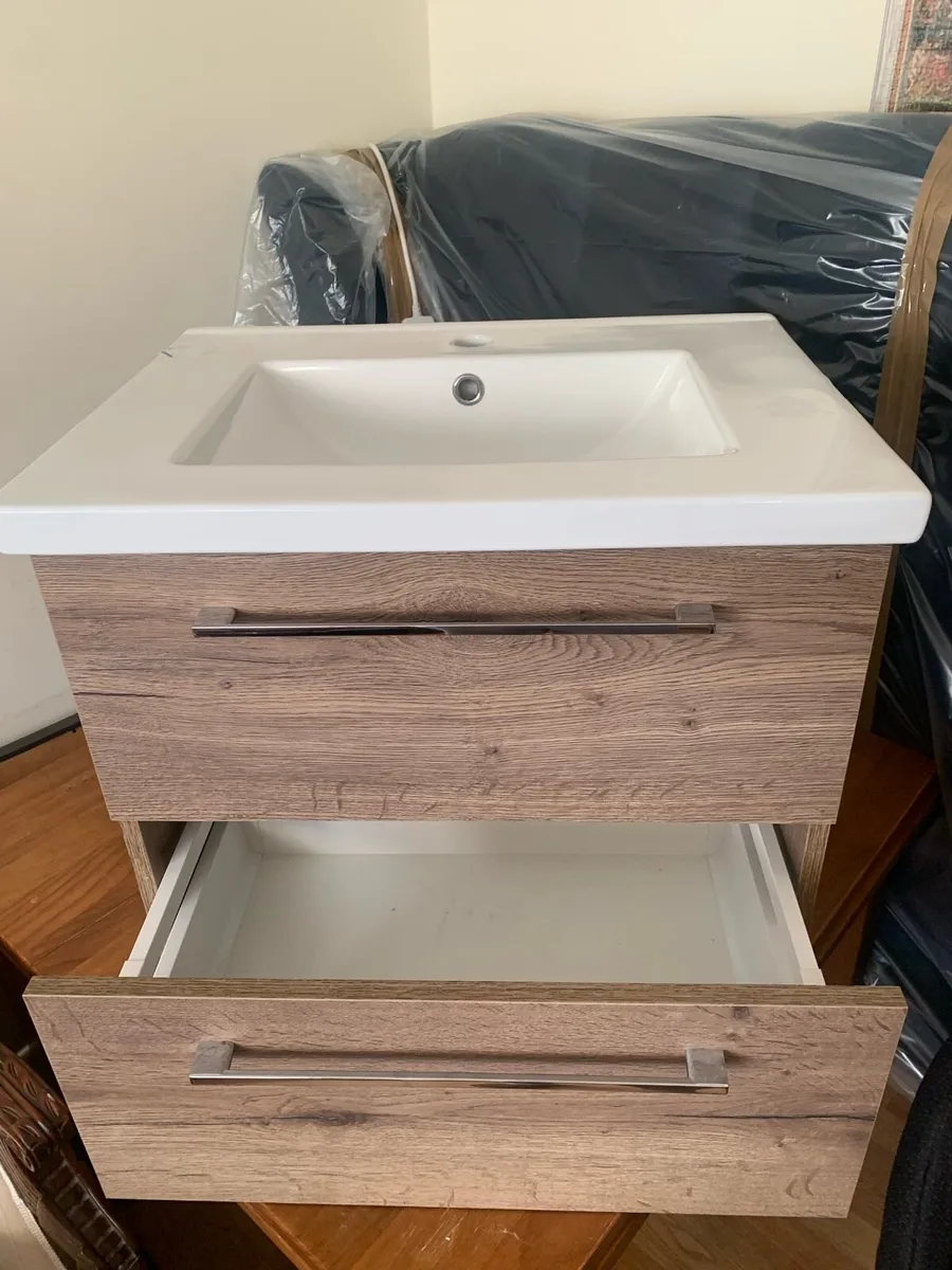 Floating dark wood sink cabinet - Image 3