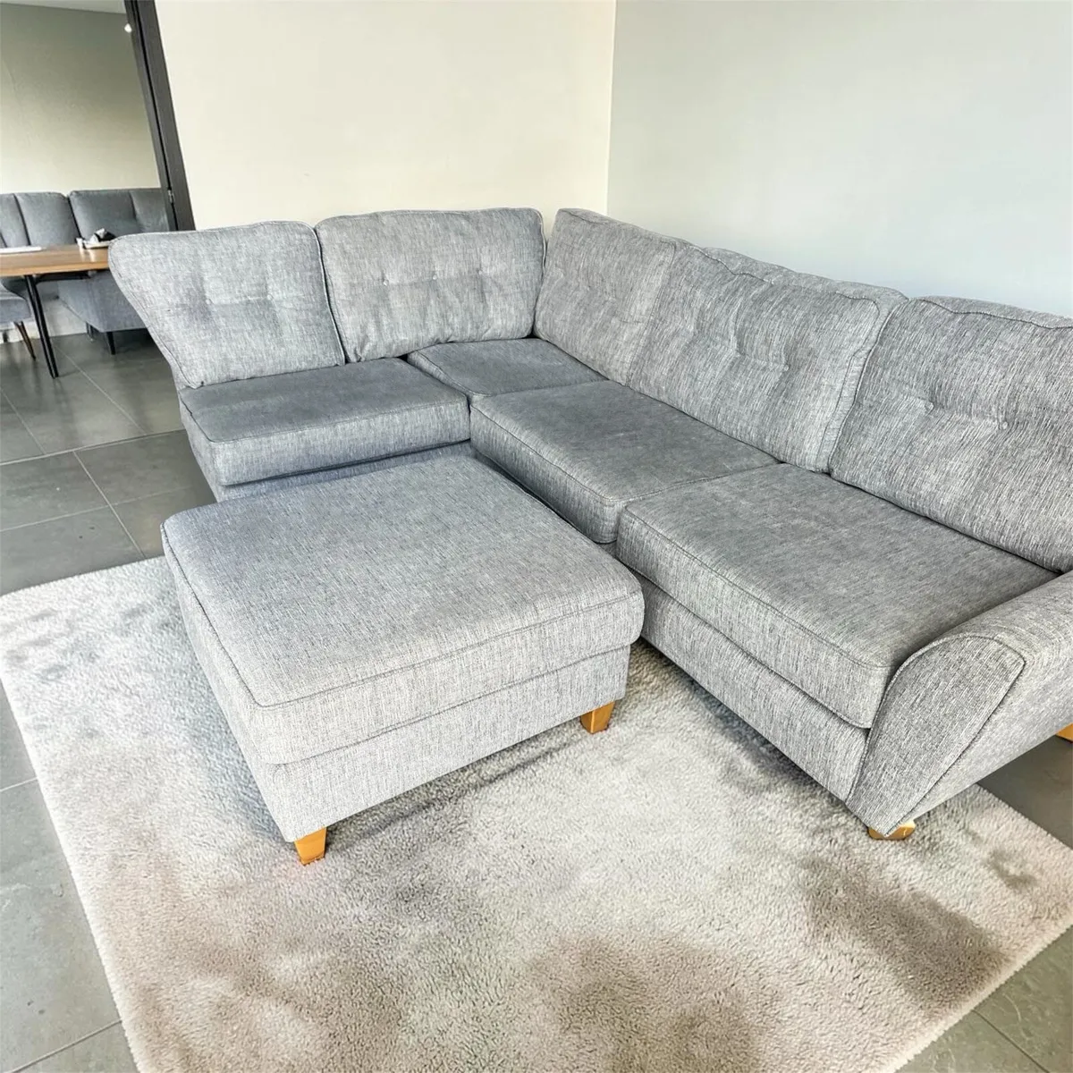 Grey corner sofa with matching footstool - Image 1