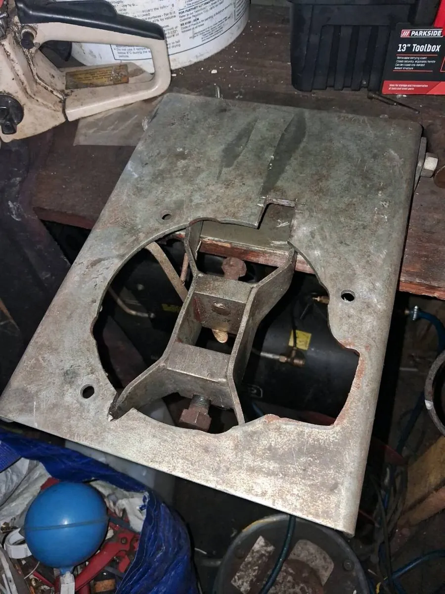 Lawnmower crank shaft straightener .