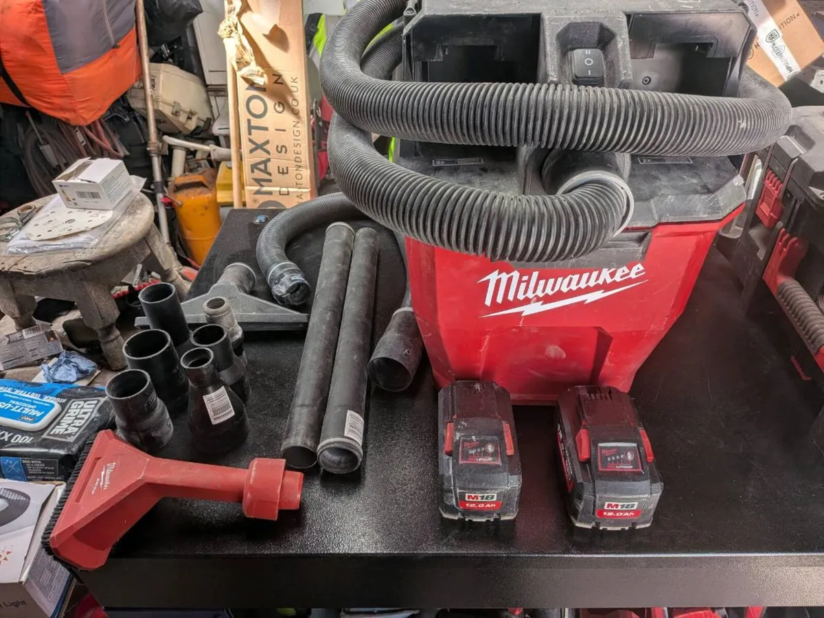 Milwaukee vacuum and batteries - Image 1